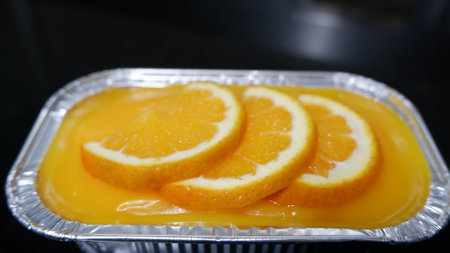 A orange cake in cup top fresh orangeの写真素材