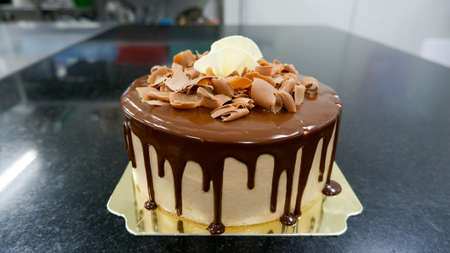 A chocolate cake on top chocolate ganacheの写真素材