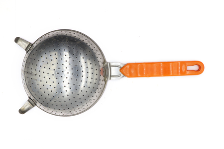 Colander, small colander , old colander , Colander with orange handle isolated on white background....