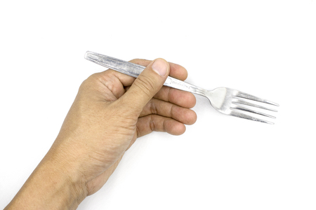 A male hand holding fork, man hand  isolated on white background High resolution image gallery.の写真素材