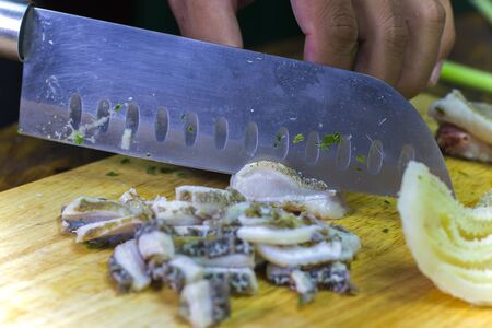 Cooking with Beef rumen on wooden board High resolution image.