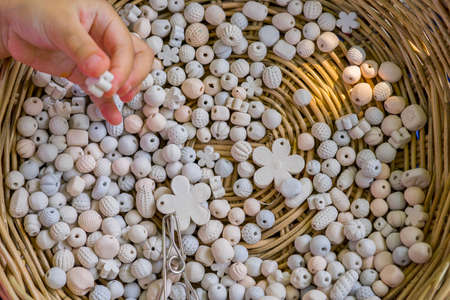 Ceramic beads with leather ropes in basket. from chiangmai Thailand.