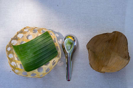 A North of Thailand rice plate meal  served on a banana leaf, save the earth concept.の写真素材