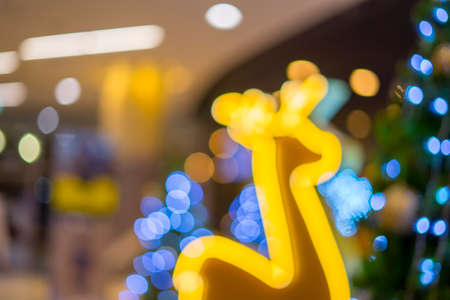 merry cristmas and happy new year Bokeh blurred Cristmas tree background,の写真素材