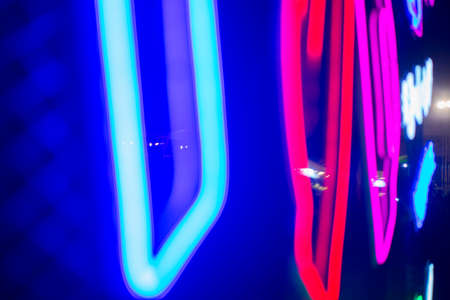 Night club interior lights, glowing lines, abstract fluorescent background.の写真素材