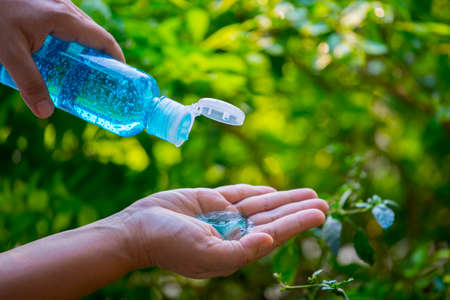 Blur background of clean hand alcohol gel sanitizer for hygiene protect weak ill chemotherapy, aids, kids patient from flu, germ, bacteria and virus covit-19 infectionの写真素材