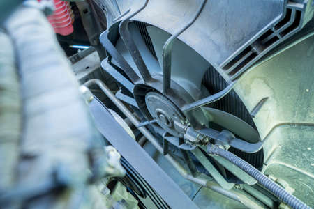 Fan of the radiator on the disassembled car,cooling system of an old car.の写真素材