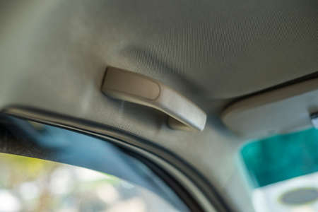 Car`s grab handle,Holding plastic car grab handler for the passenger.