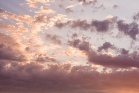 Beautiful landscape of the evening sky. The sunset of the autumn sun. Flying through clouds. Under...
