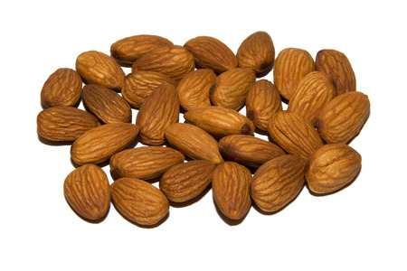 Close-up of almonds. On white background. Isolated.の写真素材