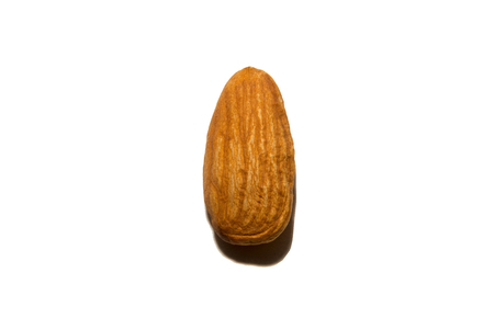 Close-up of almonds. On white background. Isolated.の写真素材
