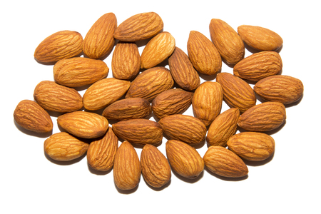 Close-up of almonds. Screen saver. On white background. Isolated.の写真素材