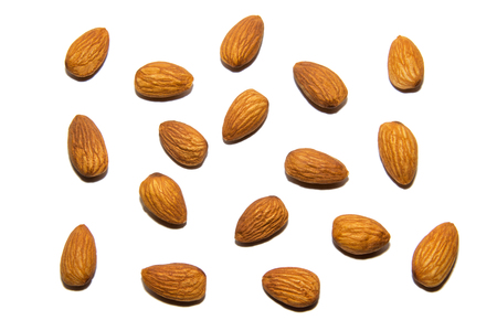 Close-up of almonds. On white background. Isolated.の写真素材