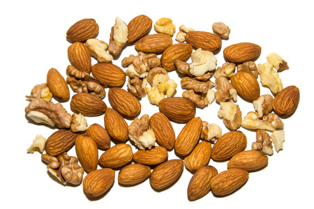 Close-up of walnut and almond. Fruits of walnuts and almonds. On white background. Isolated.の写真素材