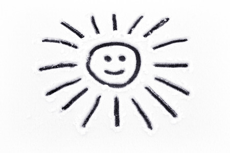 The sun on the snow. Snow, Winter, Smile. Smiley face in the snow.の写真素材
