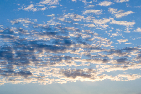 Beautiful celestial landscape. Clouds and sun at sunset. Clouds and sun at dawn. The radiance of the sunlight.の写真素材
