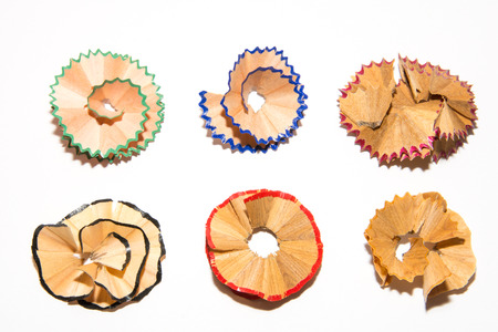 Shavings from a pencil on a white sheet of paper. Pencil shavings on white background. The patterns of the chips.の写真素材