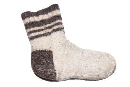 Wool socks. Warm knitted socks made of natural sheep wool. Isolated on white background.の写真素材