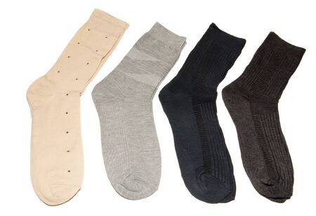 Four pairs of multi-colored thin socks. Thin, summer running socks. Isolated on white background.の写真素材