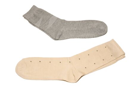 Two pairs of multi-colored thin socks. Thin, summer running socks. Isolated on white background.の写真素材