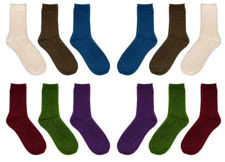 Socks of different colors. Socks in two rows on a white background. Multicolor socks on white background.の写真素材
