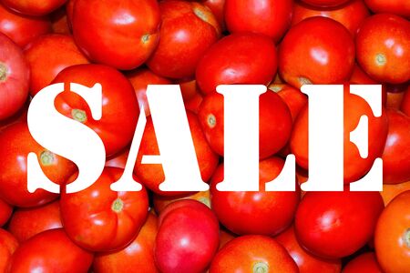 Word "Sale". Text banner. Word from tomatoes. Text on a background of red tomatoes.の写真素材