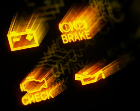 glowing dashboard signs on black backgroundの写真素材