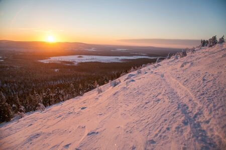 Winter mountains panorama with ski slopes and ski lifts near Vogel ski center, Sloveniaの写真素材