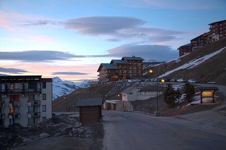 Panoramic view of ski resort three valleys and big lift in french alps - Vacation and travel concept - Winter high season opening with people having fun on mountain - Focus on sport equipmentの写真素材