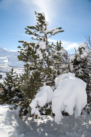 Panoramic view of ski resort three valleys and big lift in french alps - Vacation and travel concept - Winter high season opening with people having fun on mountain - Focus on sport equipmentの写真素材