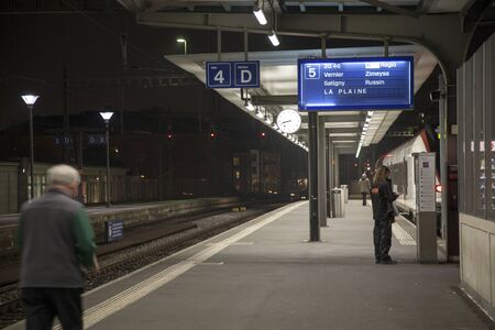 Evening scene on a railway stationの写真素材