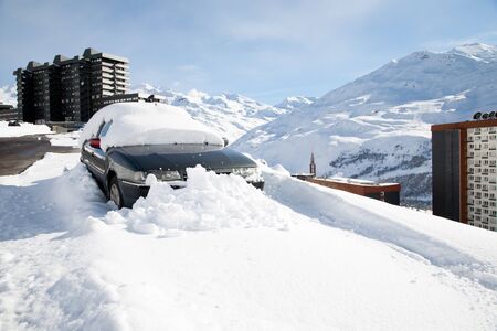 Panoramic view of ski resort three valleys and big lift in french alps - Vacation and travel concept - Winter high season opening with people having fun on mountain - Focus on sport equipmentの写真素材