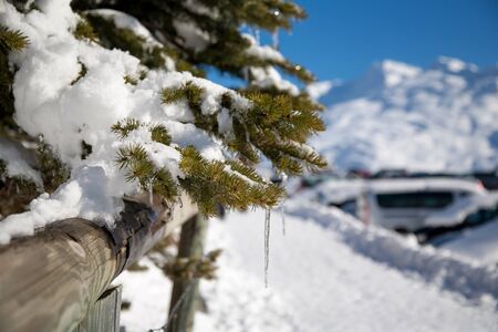 Panoramic view of ski resort three valleys and big lift in french alps - Vacation and travel concept - Winter high season opening with people having fun on mountain - Focus on sport equipmentの写真素材