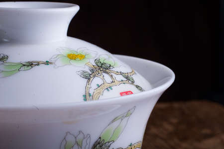 Close up of gaiwan.traditional chinese porcelian cup with sakura patternの写真素材