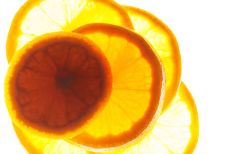 Close up group of orange slices with backlit. macro photoの写真素材