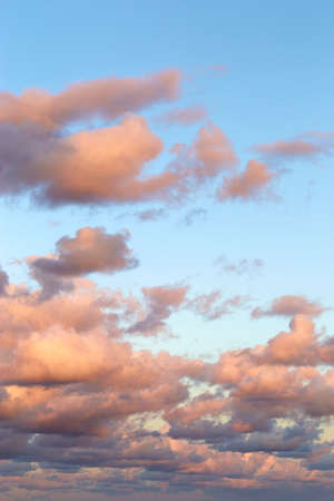 Sunset sky at sea. Dramatic sunset clouds in the Baltic Sea view from the ferry boat. Vertical...