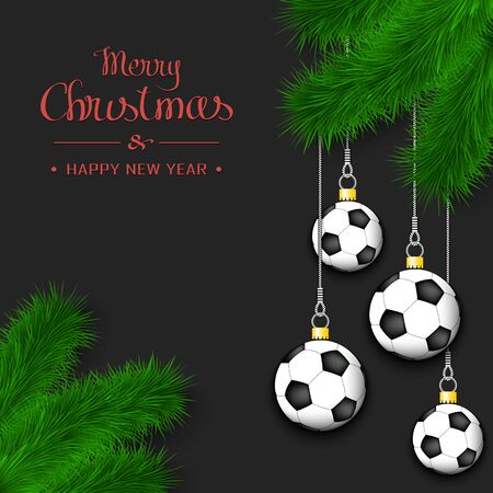 Marry Christmas and Happy New Year. Soccer balls as a Christmas decorations hanging on a Christmas tree branch.のイラスト素材