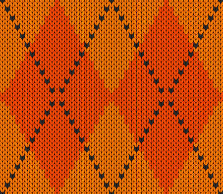 Knitted argyle Halloween pattern. Wool knitting. Scottish plaid in orange and yellow rhombuses. Seamless fabric texture. Vector illustrationのイラスト素材