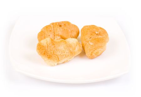 Isolated croissants on plateの写真素材