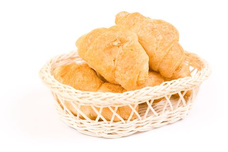 Isolated croissants in basketの写真素材