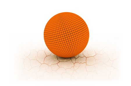 Big and heavy ball on cracked earthの写真素材