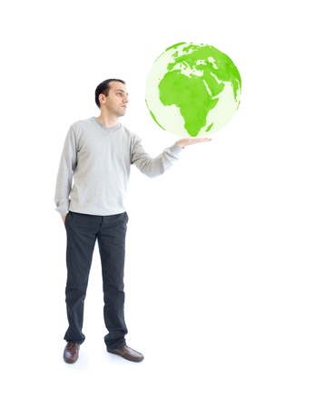 young man holding green planet earthの写真素材