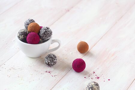 Homemade Chocolate truffles rolled in freeze-dried pitahaya, cocoa powder, ground almond and coconut...
