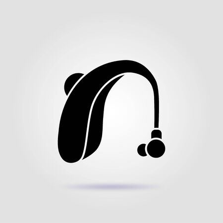 Hearing amplifier black icon on a gray background with soft shadowのイラスト素材