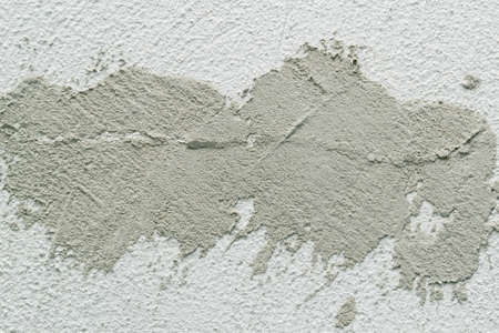 Concrete background. Plaster on the wall. Embossed textured surface.の写真素材