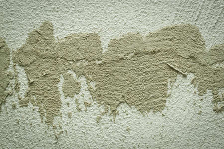 Concrete background. Plaster on the wall. Embossed textured surface.の写真素材