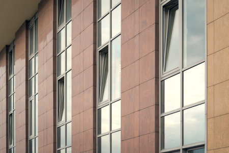 modern building background with rows of glass windows
