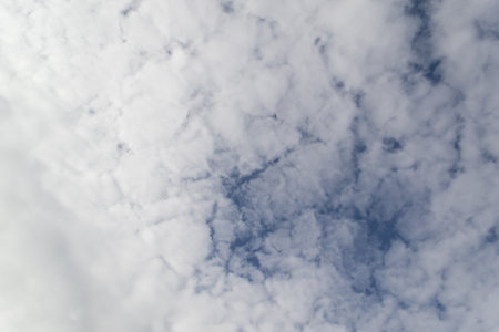 Beautiful clouds in the sky. The cumulus clouds are high in the air.の写真素材