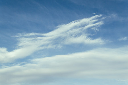 Beautiful clouds in the sky. The cumulus clouds are high in the air.の写真素材