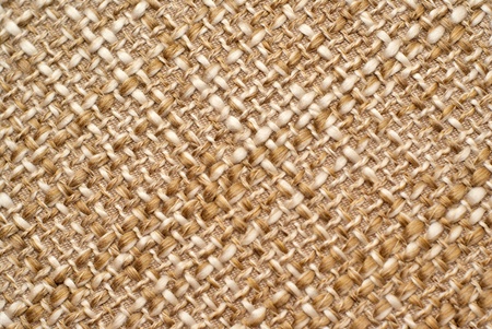 large woven linen background in yellow-brown